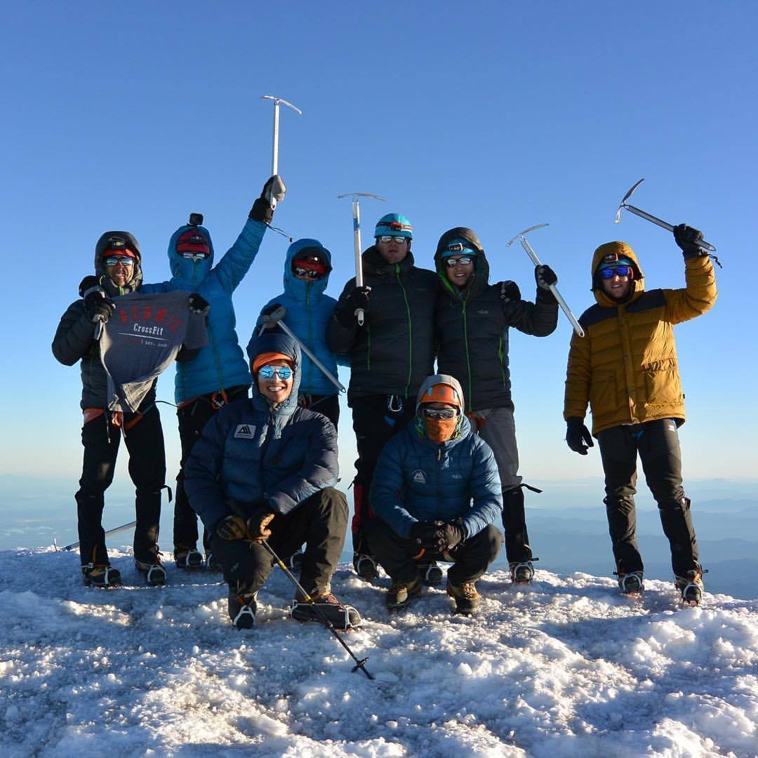 Group of mountaineers summiting Mt. Rainier